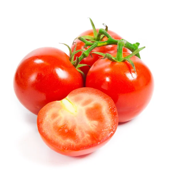 白で隔離されるつるのトマトのクローズ アップ. — ストック写真