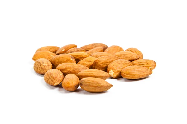 Heap of almond nuts isolated on white background — Stock Photo, Image