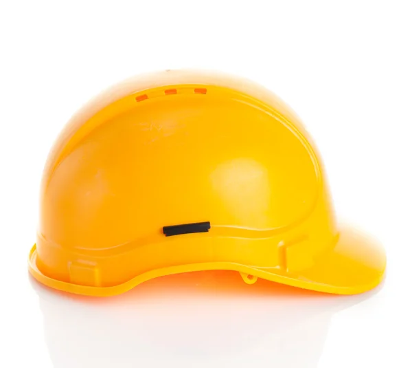 Capacete de segurança amarelo no fundo branco. — Fotografia de Stock