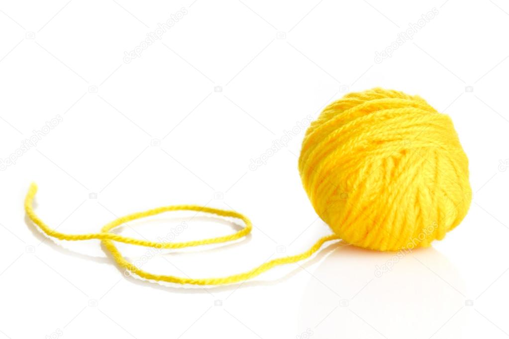 Yellow wool yarn ball isolated on white background