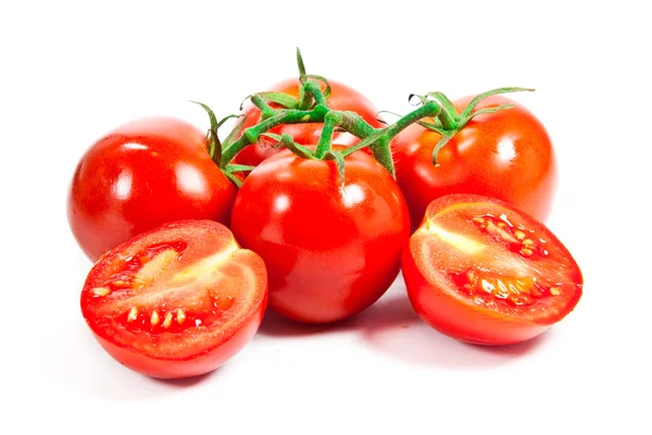 Closeup of tomatoes on the vine — Stock Photo, Image