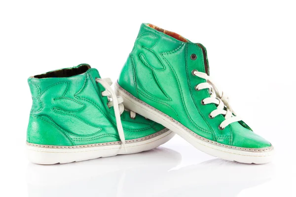 Зеленим кросівки — стокове фото