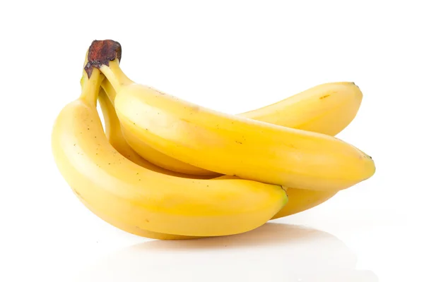 Bananes mûres sur un blanc — Photo