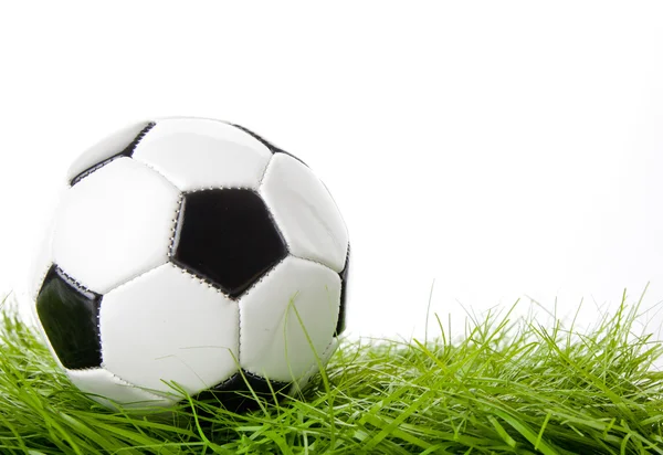 Soccer ball on the green field — Stock Photo, Image