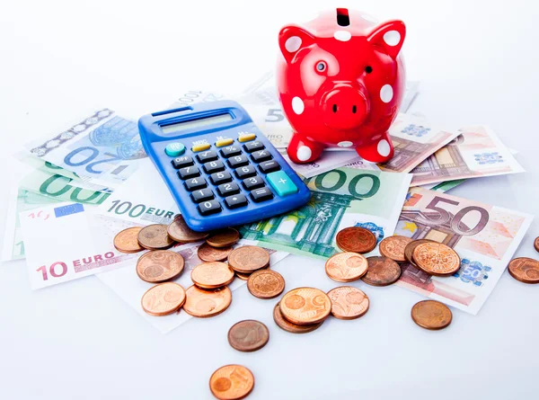 Piggy bank met Rekenmachine en geld — Stockfoto