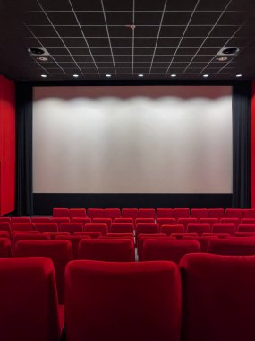 Cinema Screen  And Red Seats. Empty Screening Theater