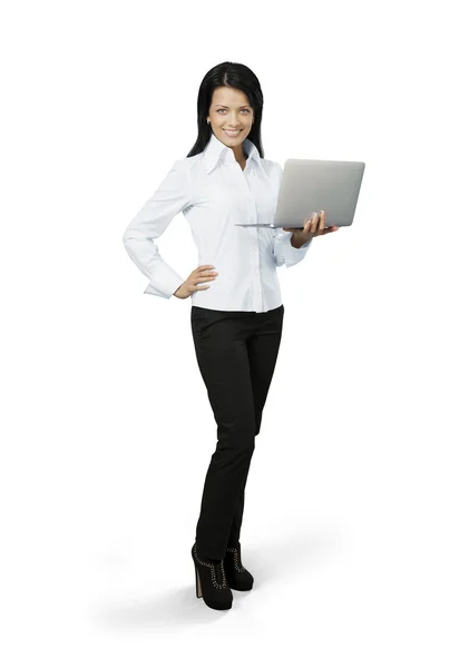 Sexy smiling brunette businesswoman holding laptop. — Stock Photo, Image