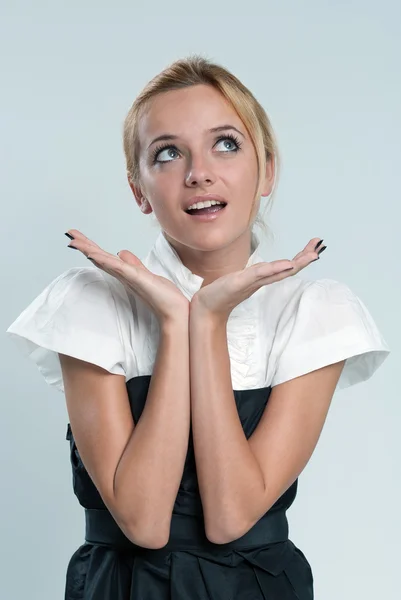 Surprised sexy blonde! Lady against grey background wearing fash — Stock Photo, Image