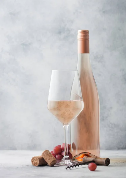 Glass Bottle Summer Pink Rose Wine Grapes Corks Corkscrew Light — Stock fotografie