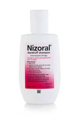 LONDON, UK - JULY 06, 2022: Nizoral dandruff shampoo on white.