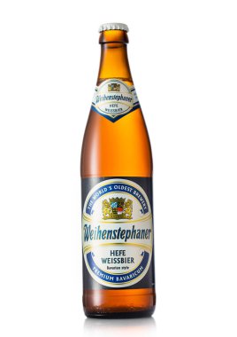 LONDON, UK - JUNE 22, 2022: Bottle of Weihenstephaner wheat beer on white.
