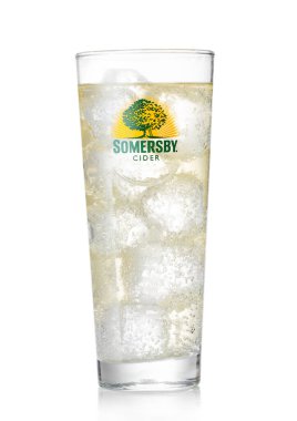 LONDON, UK - AUGUST 12, 2022: Original glass of Somersby pear cider with ice cubes on white.