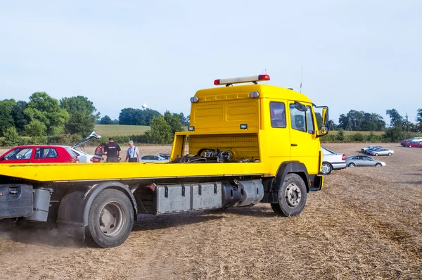 Oranje noodgevallen auto — Stockfoto