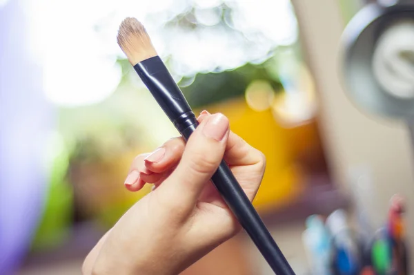 Girl making up — Stock Photo, Image