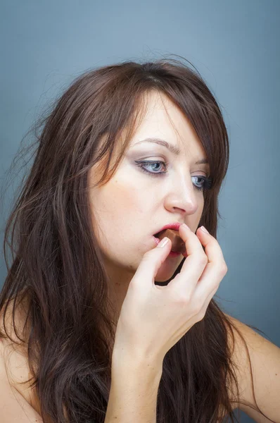 Sexy girl with a chocolate — Stock Photo, Image