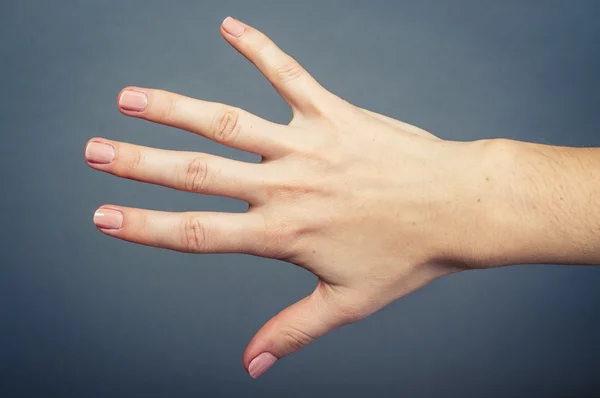 Vrouwelijke hand geïsoleerd — Stockfoto