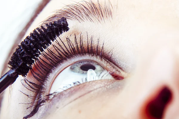 Girl making up — Stock Photo, Image