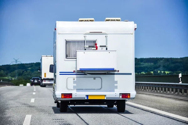 Camper on road — Stock Photo, Image