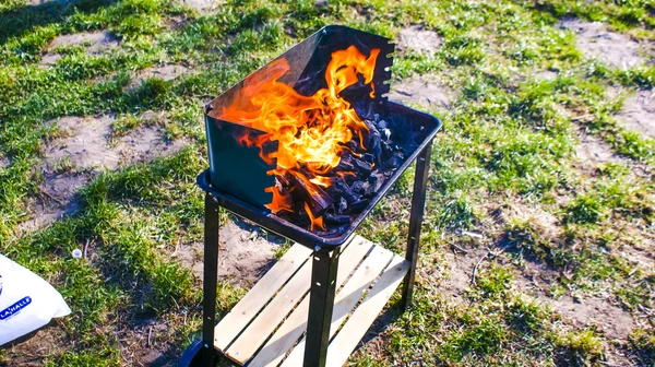 Grill in the flame — Stock Photo, Image
