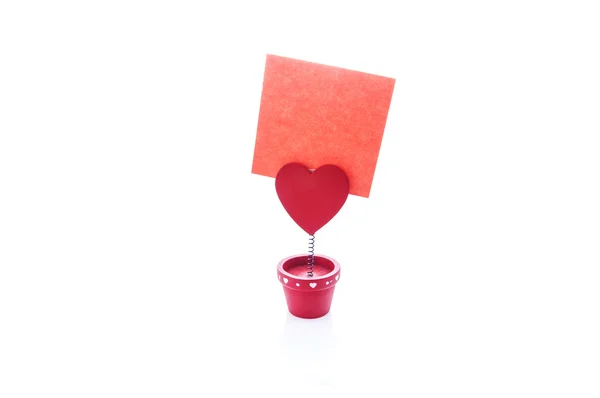 Red holder with heart and paper — Stock Photo, Image