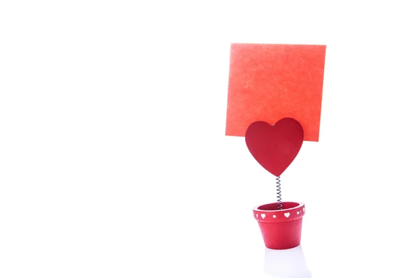 Red holder with heart and paper — Stock Photo, Image