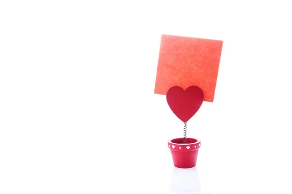 Red holder with heart and paper — Stock Photo, Image