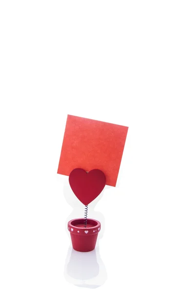 Red holder with heart and paper — Stock Photo, Image