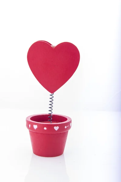 Red holder with heart and paper — Stock Photo, Image