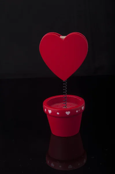 Red holder with heart and paper — Stock Photo, Image