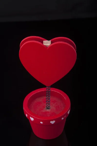 Red holder with heart and paper — Stock Photo, Image