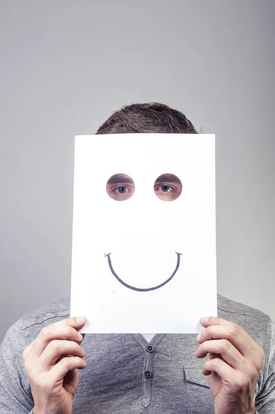 Man hold paper with emotions — Stock Photo, Image