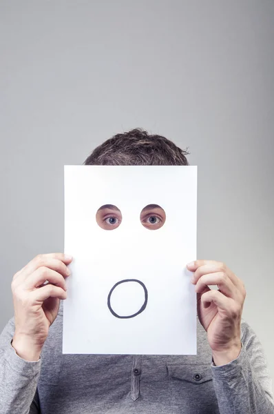 Man hold paper with emotions — Stock Photo, Image