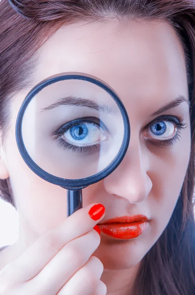 Women with magnifying glass — Stock Photo, Image