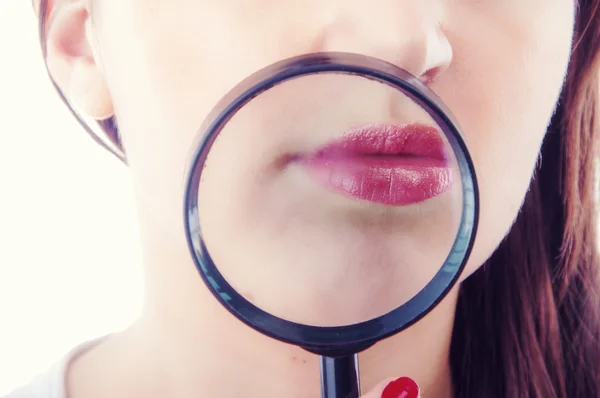 Women with magnifying glass — Stock Photo, Image