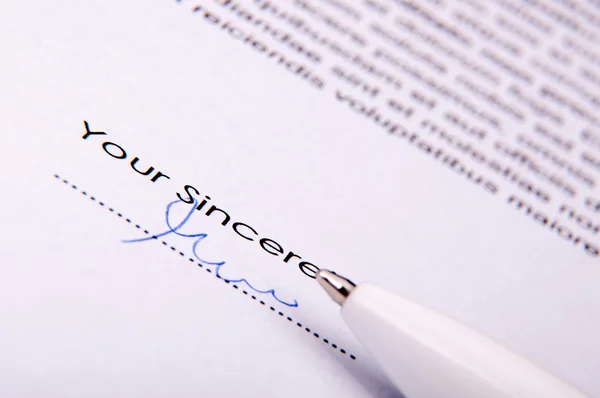 Signature over agreement — Stock Photo, Image