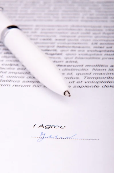 Signature over agreement — Stock Photo, Image