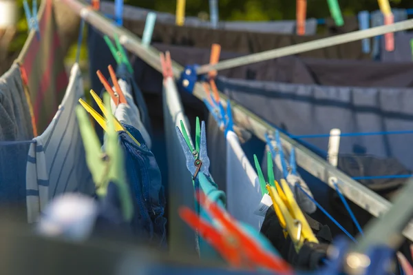 Clothes hanging on the dryer — Stock Photo, Image