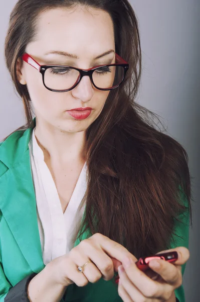 Mujer de negocios con teléfono — Foto de Stock