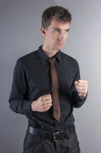 くいしばられた握りこぶしを持ったビジネスマン — ストック写真