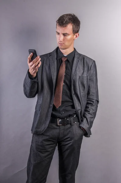 Businessman using a mobile phone — Stock Photo, Image