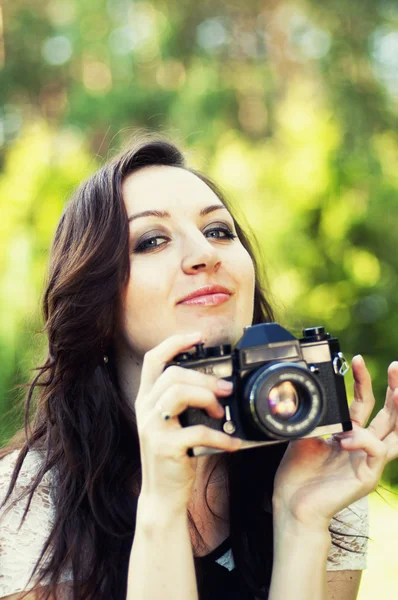 Beautiful woman photographer — Stock Photo, Image