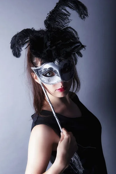 Beautiful young girl with venetian mask — Stock Photo, Image