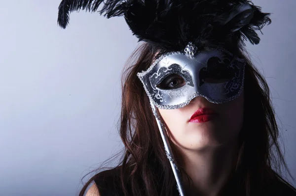 Beautiful young girl with venetian mask — Stock Photo, Image