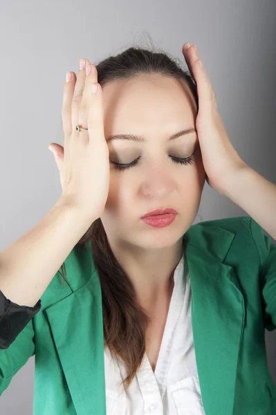 Zakenvrouw met hoofdpijn — Stockfoto