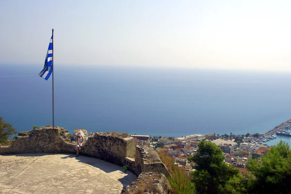 Greek flag on the top of the fortress in zakynthos — Stock Photo, Image