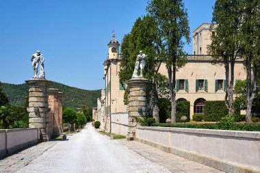 Gravel access road to Castello del Catajo in Italy