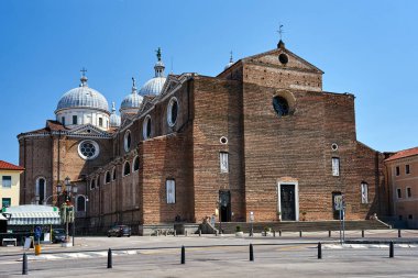 Facade and domes of the medieval Basilica de Santa Justina church in the city of Padua, Italy