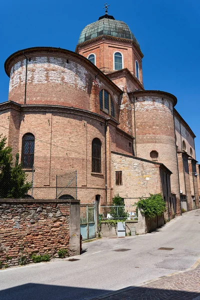 Tower and dome of the medieval Basilica di Santa Maria delle Grazie in the city of Este, Italy
