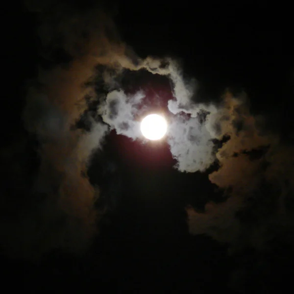 Cloudy night sky with moon — Stock Photo, Image