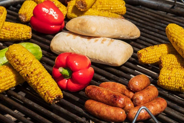 Various Snacks Grill Plate Sausages Corn Red Paprika Chiabatta Tasty — Fotografia de Stock